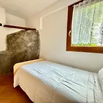A House Between A Waterfall And A The Enchantment Of *