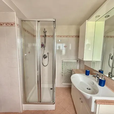 A House Between A Waterfall And A The Enchantment Of شقة نيسّو