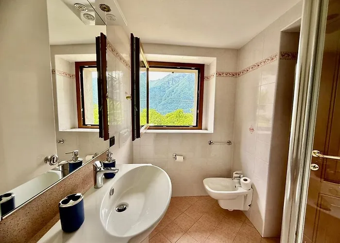 A House Between A Waterfall And A The Enchantment Of