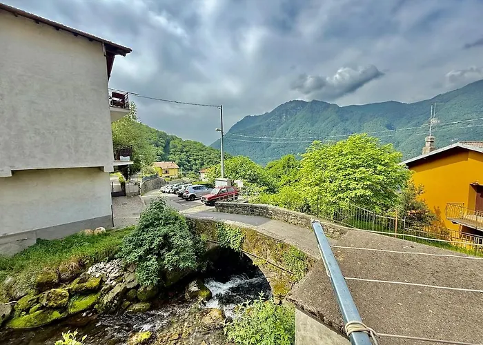 A House Between A Waterfall And A The Enchantment Of *