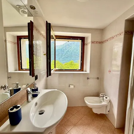 A House Between A Waterfall And A The Enchantment Of