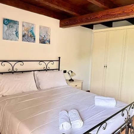 A House Between A Waterfall And A The Enchantment Of