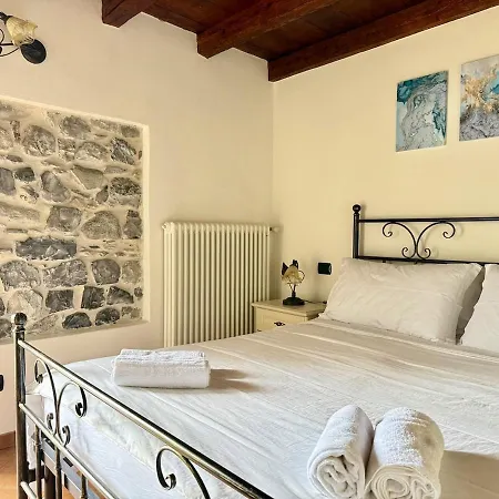 A House Between A Waterfall And A The Enchantment Of Lejlighed